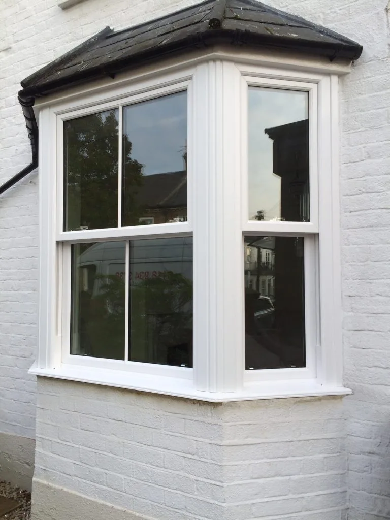 3 facet white bay window with vertical sliders