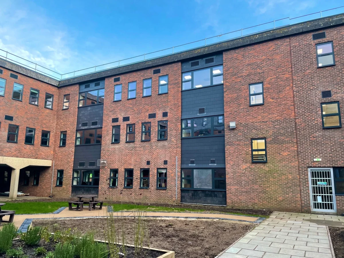 grey aluminium windows in brick walls