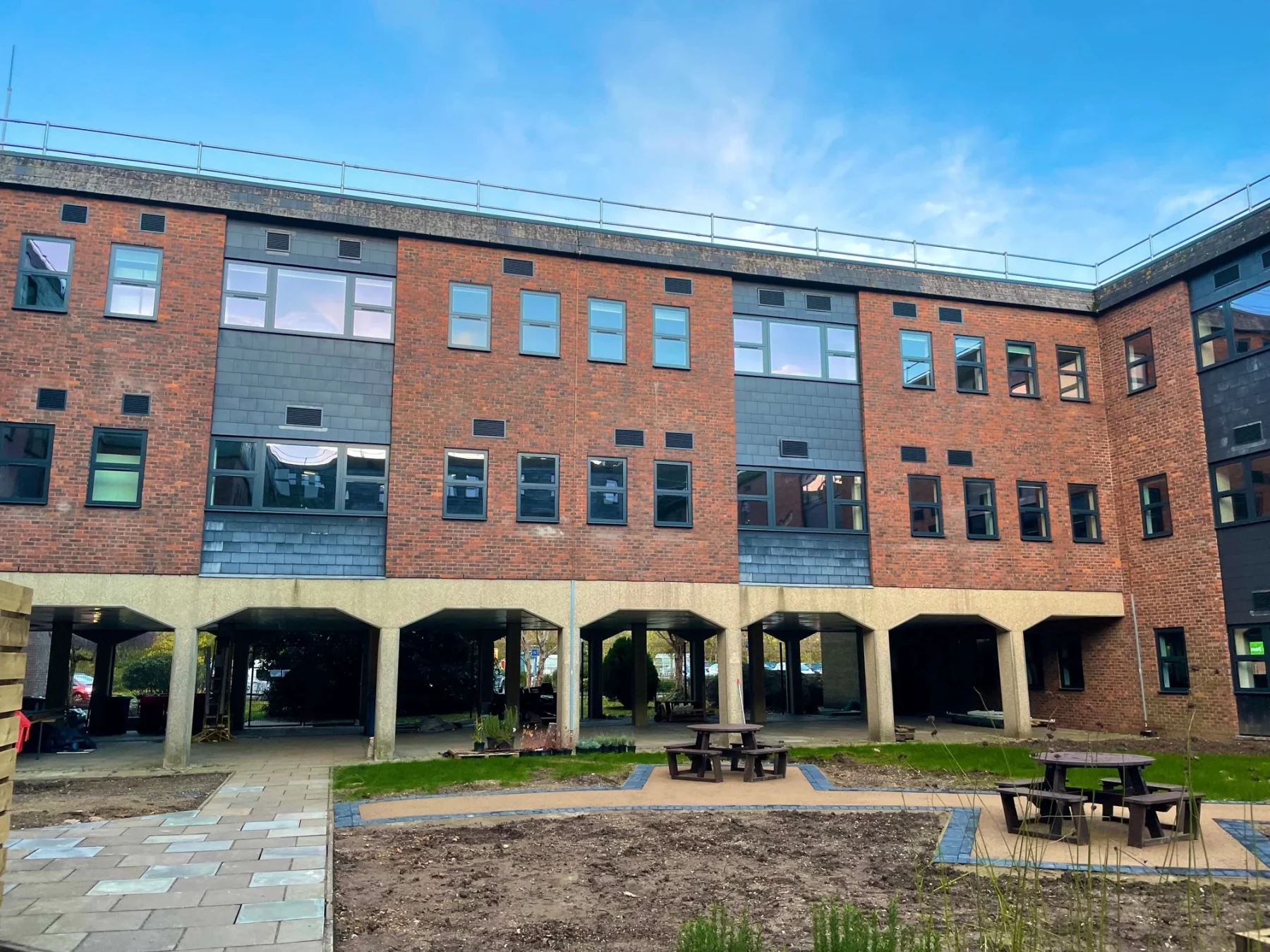 grey aluminium windows in brick office block in hampshire