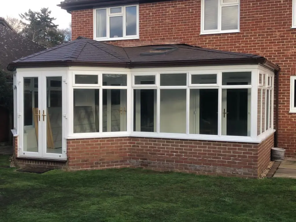 combination conservatory roof replacement viewed from garden with tapco tiles