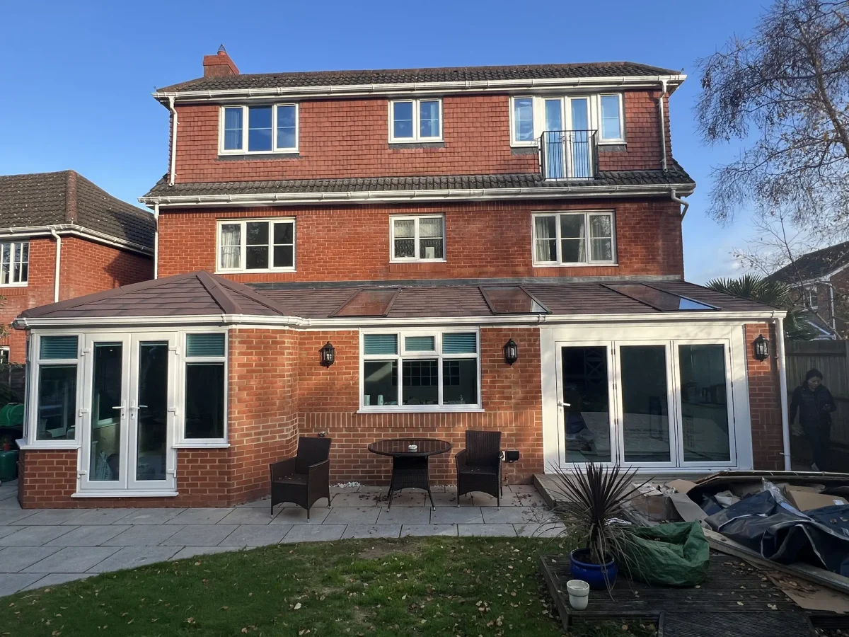 combination replacement conservatory roof on three storey house