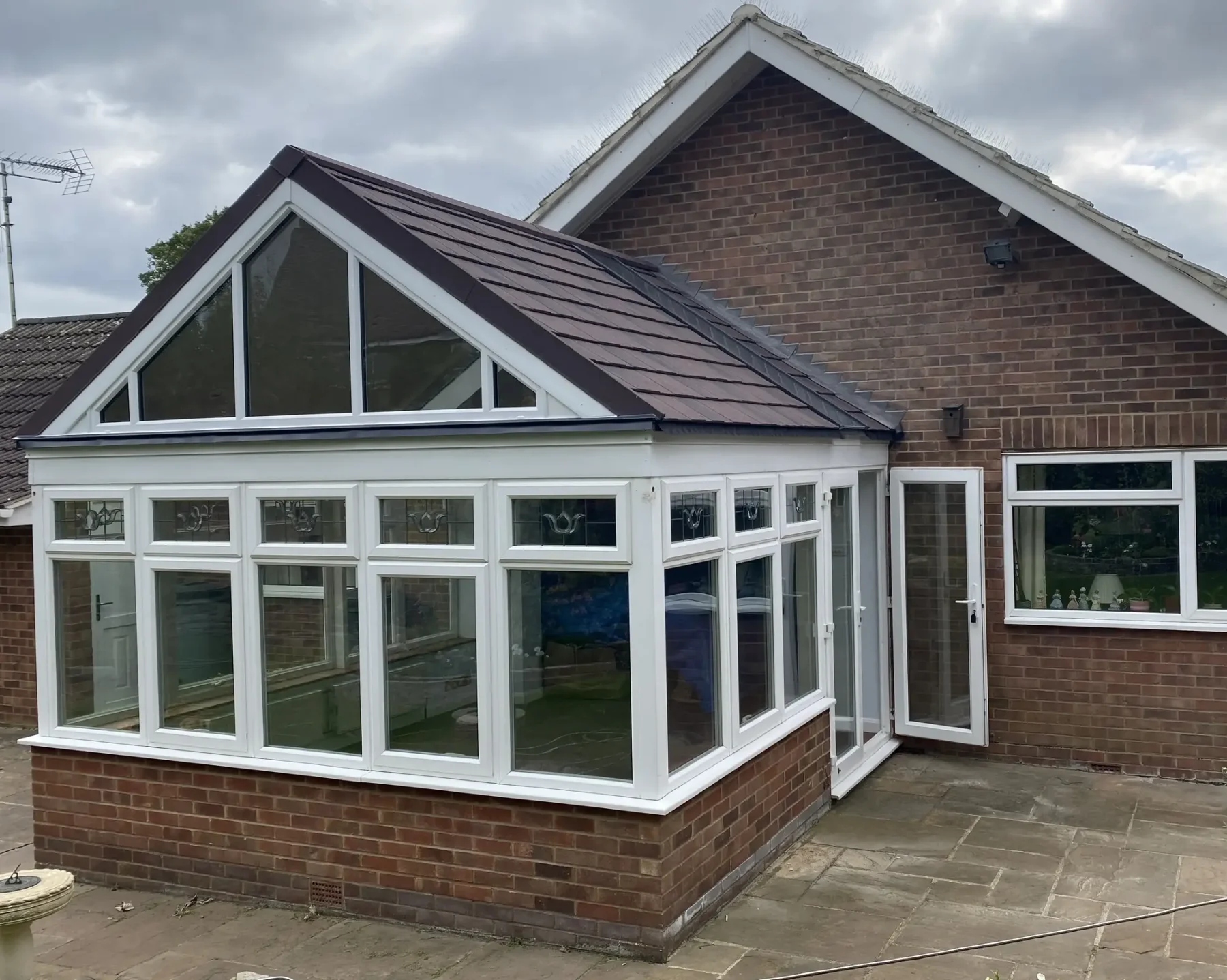 regency conservatory roof replacement with solstice units and burnt umber metro tiles