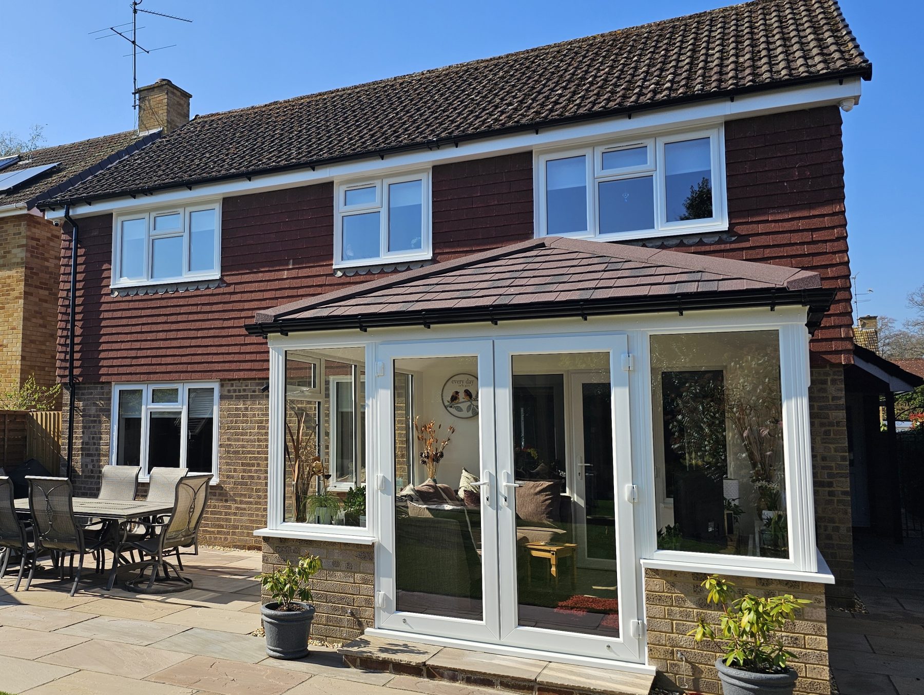 edwardian solid roof with burnt umber tiles